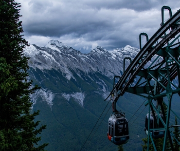 Banff Gondola with view of snowy mountains Banff Gondola with view of snowy mountains