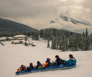 people tubing at Mount Norquay in Banff people tubing at Mount Norquay in Banff