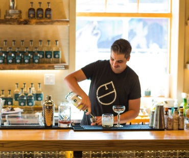 Staff pouring spirits at Fernie Distillers Staff pouring spirits at Fernie Distillers
