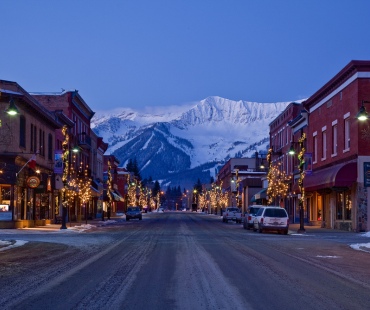 Fernies Downtown area with shops and mountains in the distance Fernies Downtown area with shops and mountains in the distance