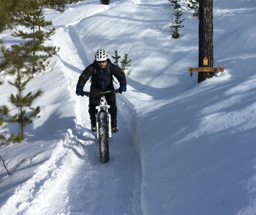 Pedalling through the snow on a Fat Bike Pedalling through the snow on a Fat Bike