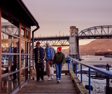Bridge, sunset and shoppers at granville island Bridge, sunset and shoppers at granville island