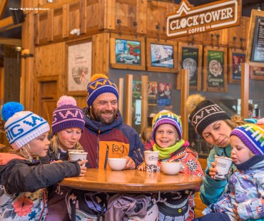 Family enjoying a hot drink and break from the slopes at Clock Tower Coffee Family enjoying a hot drink and break from the slopes at Clock Tower Coffee