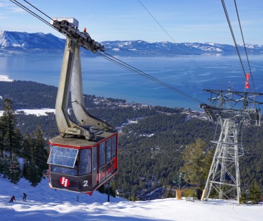 Heavenly large gondola going up the hill Heavenly large gondola going up the hill