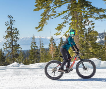 Person riding winter fat bike on trails at northstar Person riding winter fat bike on trails at northstar