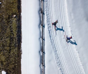 overview of cross country skiers on nordic trail overview of cross country skiers on nordic trail