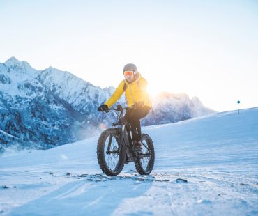 Person riding Fat Bike on the snowy trails Person riding Fat Bike on the snowy trails