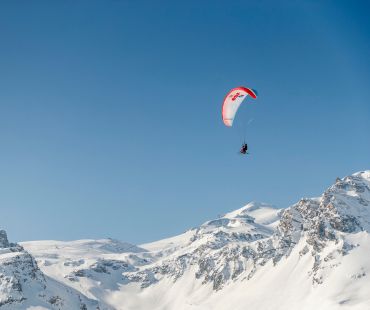 Tandem paragliders high in the sky Tandem paragliders high in the sky