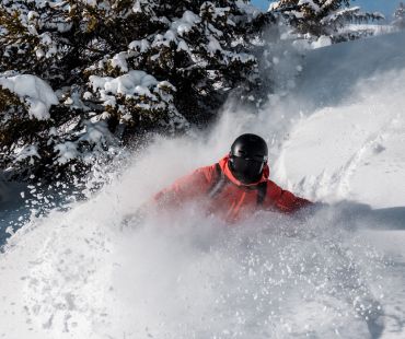 Rider in the deep powder snow Rider in the deep powder snow