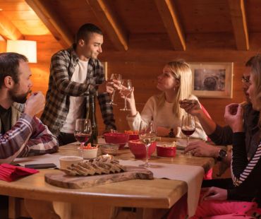People enjoying wine and fine dining People enjoying wine and fine dining