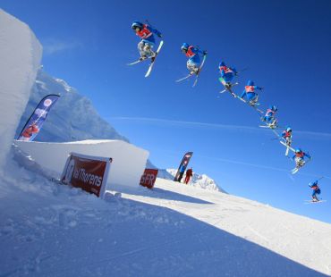 Skier performing tricks at Val Thorens Snow park Skier performing tricks at Val Thorens Snow park