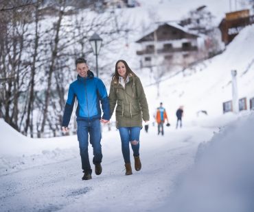 Couple hiking in the beautiful mountain trails Couple hiking in the beautiful mountain trails