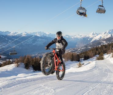 Person riding Fat Bike on snowy trails Person riding Fat Bike on snowy trails